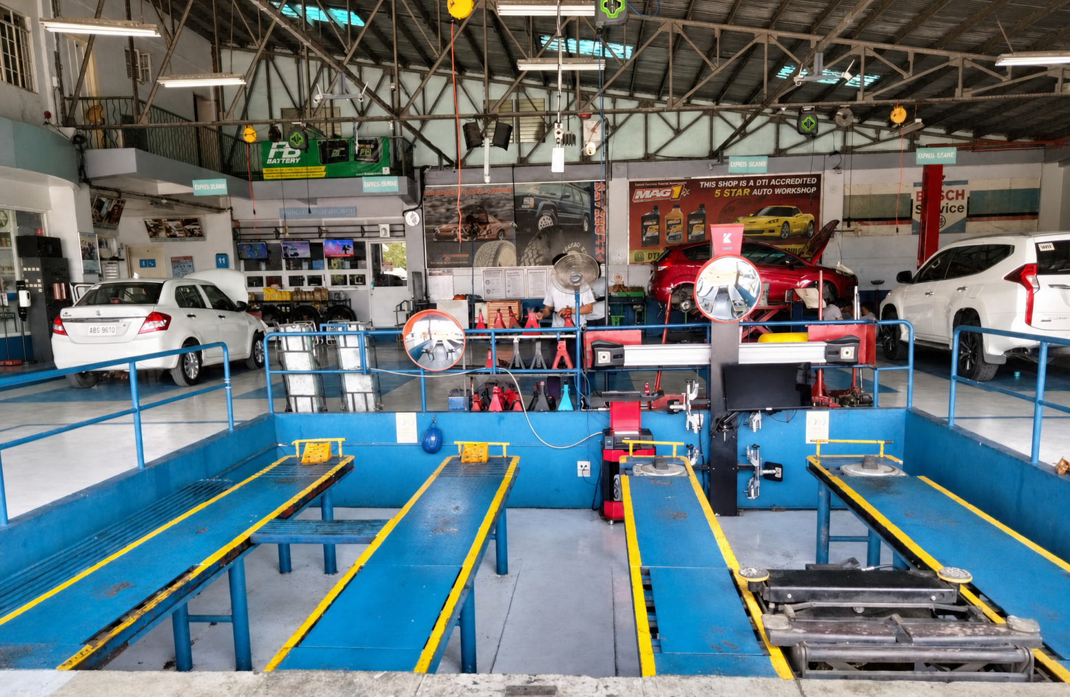 Wheel alignment and automotive service bays